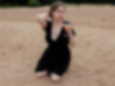 Hottie in black dress on the beach by StellaGrant
