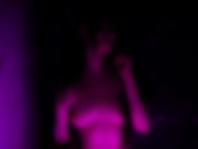 Naked body in neon light in the shower by Olivia Wanna Fun