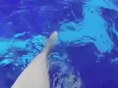 feet in water by Caroline