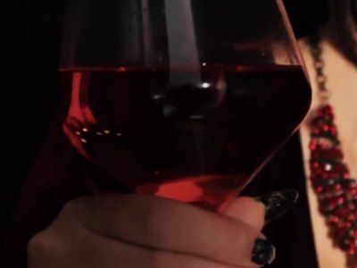with a glass of sparkling wine