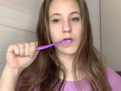 Brushing teeth by Stacy
