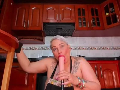 THE COOK LIKES TO SUCK THE DILDO BEFORE COOKING by Gianella-Cox