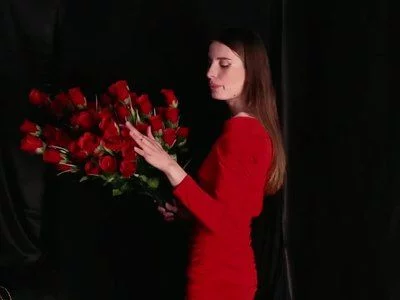 with a bouquet of red roses by DominikaRoyko