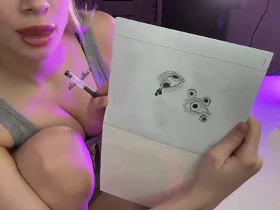 Drawing a tattoo sketch by Lucy