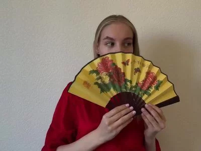 Trying to be graceful with a fan lol by lili-fate