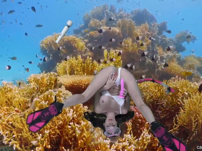 Swimmer Spinner Charley Summer fucks herself in the ocean