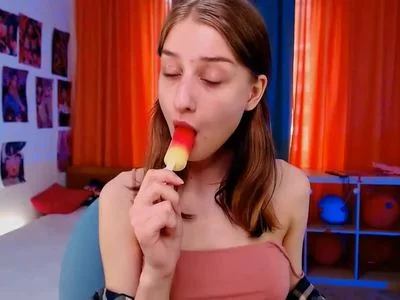 Sucking and eating a tasty snowcone! by Molly-May